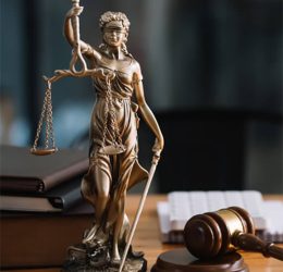 statue-of-lady-justice-on-desk-of-a-judge-or-lawye-SVECXT5-intro.jpg